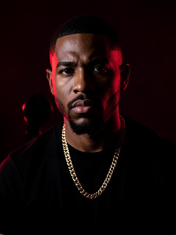 72DIAMONDS lit by a red key light in the Outlet studio